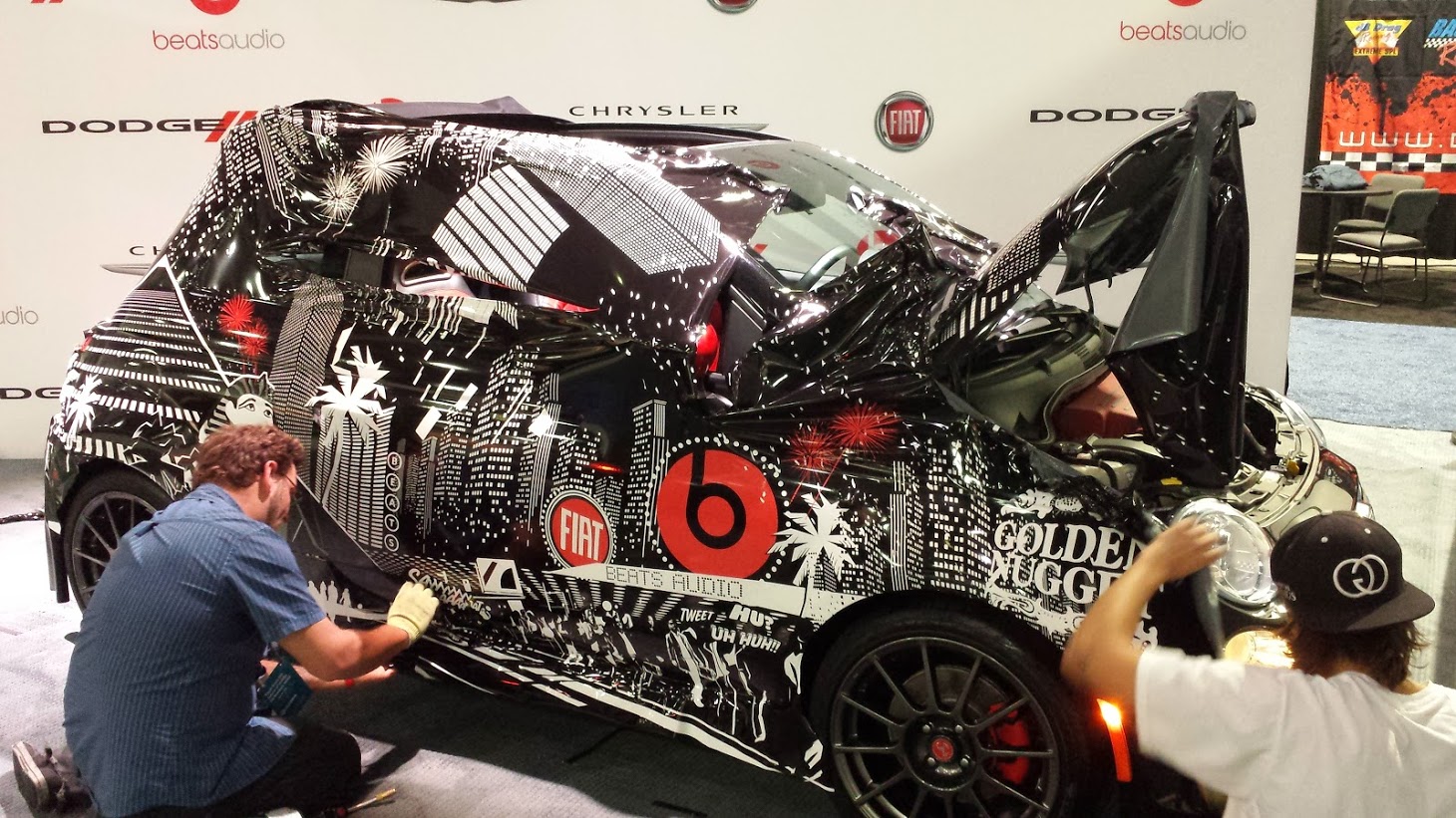 Fiat Beats Audio custom vehicle wrap installation at trade show