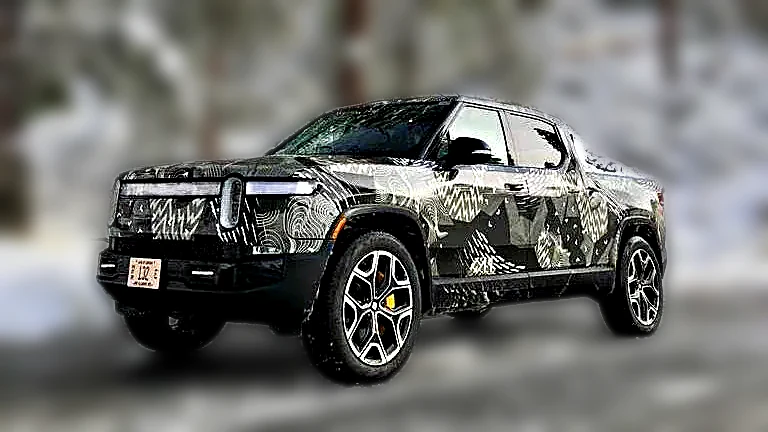 Custom camo color-change wrap on a Rivian R1T by Chicago Fleet Wraps