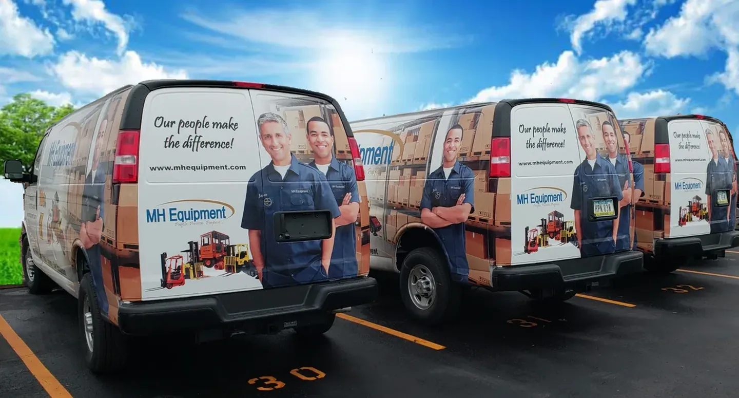 MH Equipment cargo van fleet wrap by Chicago Fleet Wraps - three vehicle fleet wrap commercial install